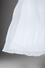 close up kids white dress pleated fabric