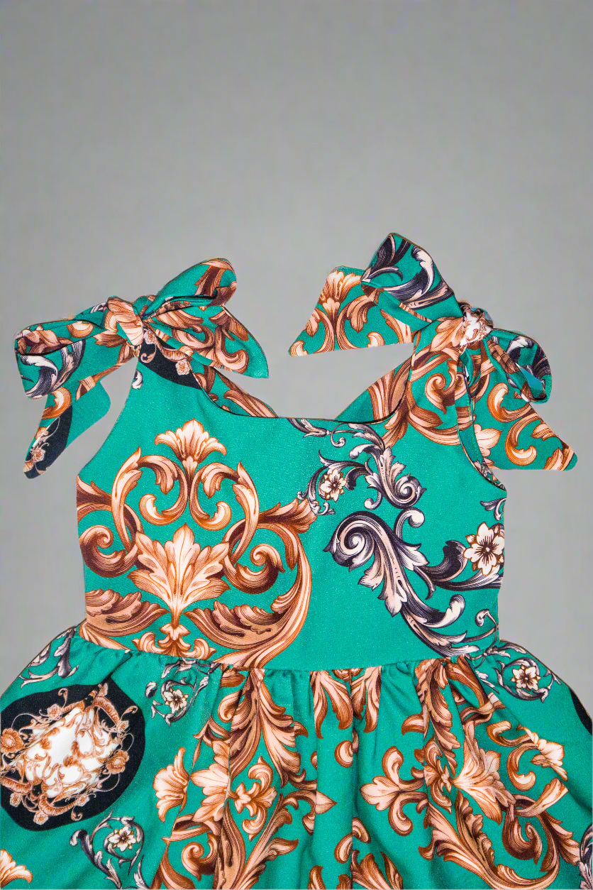 girls green sleeveless dress with bow straps