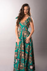 flared green long dress with v neck and tie straps