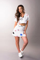 woman white set crop top and flared skirt
