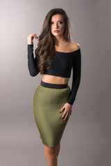 woman wearing high waist olive green pleated skirt