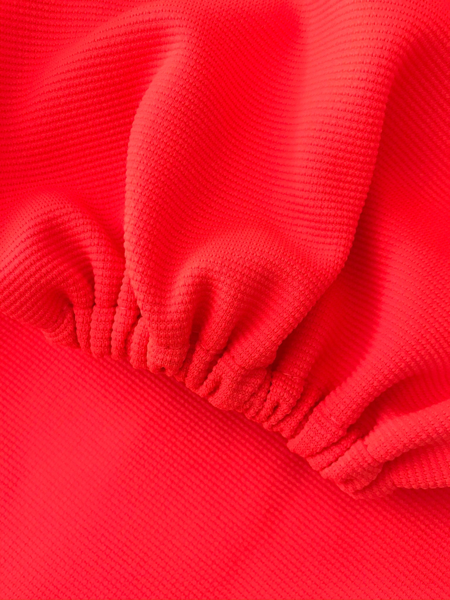 close up textured orange fabric