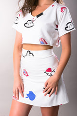 woman wearing white cotton set t-shirt with a-line skirt